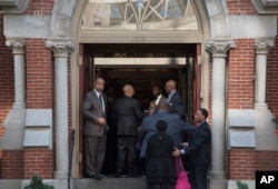 Attendees arrive at Metropolitan A.M.E. Church for the memorial service for journalist Gwen Ifill in Washington, Nov. 19, 2016.