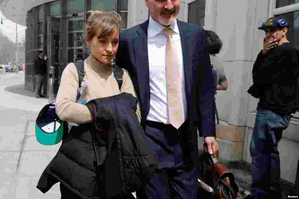 Actress Allison Mack departs the Brooklyn Federal Courthouse after facing charges regarding sex trafficking and racketeering related to the NXIVM cult case in New York, April 8, 2019.