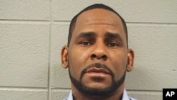 In this Wednesday, March 6, 2019 booking photo released by the Cook County Sheriff’s Office is R. Kelly. A Cook County Sheriff's Office official says singer Kelly won't be released from jail until he pays $161,000 in back child support he owes.