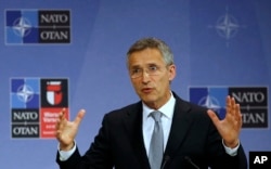 FILE - NATO Secretary General Jens Stoltenberg speaks during a news conference at NATO headquarters in Brussels, Belgium.