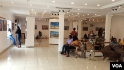 Visitors look at exhibits at the Thought Pyramid Art Center in Abuja, September 21, 2021. (Timothy Obiezu/VOA)