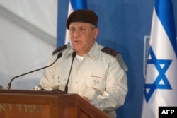 FILE - Israel's Chief of Staff Gadi Eisenkot delivers a speech at the Prime Minister's Jerusalem offices, Feb. 16, 2015.