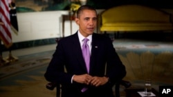 US President Barack Obama records the weekly address, 01 Oct 2010 (file photo)