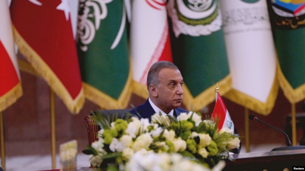 FILE: Iraqi Prime Minister Mustafa al-Kadhimi attends a summit meeting in Baghdad, Iraq, August 28, 2021.