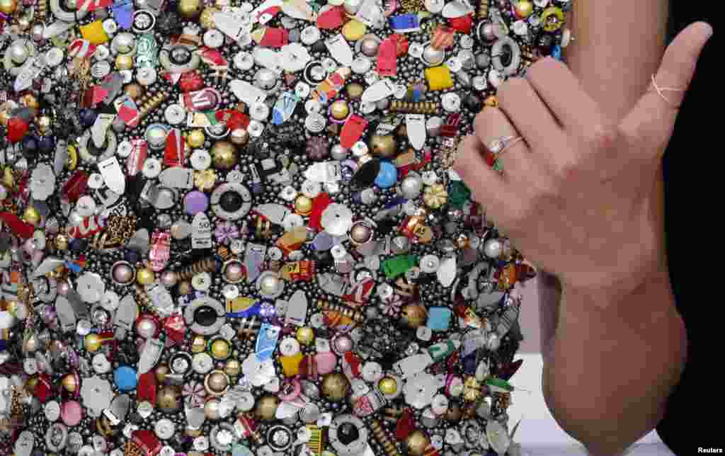 Detail of Marion Cotillard&#39;s dress is pictured as she poses during a photocall for the film Deux Jours, Une Nuit (Two Days, One Night) in competition at the 67th Cannes Film Festival.