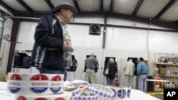 Voters cast ballots at Amick's Ferry Fire Station during the South Carolina presidential Primary in Chapin, South Carolina, January 21, 2012.