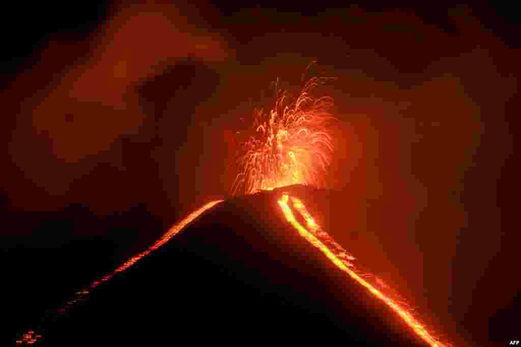 The Pacaya volcano erupts as seen from Rodeo village in San Vicente Pacaya municipality about 45 km south of Guatemala City, June 20, 2020.