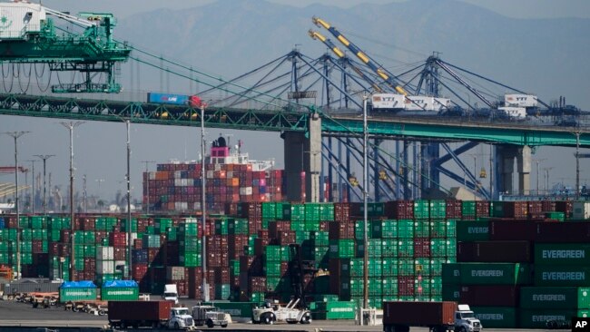 Containers are stacked at the Port of Los Angeles in Los Angeles, Oct. 1, 2021