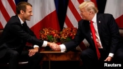FILE - U.S. President Donald Trump meets French President Emmanuel Macron in New York, Sept. 18, 2017.