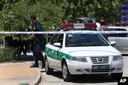 Police secure the area around the shrine of late Iranian revolutionary founder Ayatollah Khomeini, in Tehran, Iran, June 7, 2017.