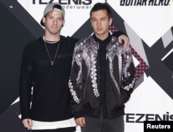 FILE - Twenty One Pilots pose on the red carpet during the MTV EMA awards at the Assago forum in Milan, Italy.