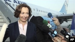 French Minister of Foreign Trade Anne Marie Idrac disembarks from France's Aigle Azur airlines plane in Baghdad, Iraq, 31 Oct 2010