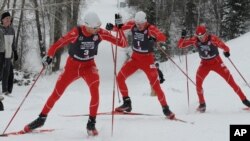 Johnny Spillane (left) leads a parade of three World Champions, Billy Demong and Todd Lodwick (right) at the Olympic Trials at Howelsen Hill in Steamboat Springs, Colorado