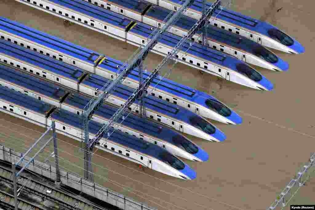 A Shinkansen bullet train rail yard is seen flooded due to heavy rains caused by Typhoon Hagibis in Nagano, central Japan.