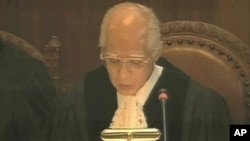 Judge Owada is seen in the Great Hall of Justice at the World Court in The Hague, Netherlands, announcing that Kosovo's declaration of independence did not violate general international law