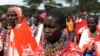 FILE - Kenyan Maasai women gather during a meeting dedicated to the practice of female genital mutilation (FGM) in which several participants voiced opposition to a ban currently in place, June 12, 2014, in Enkorika, Kajiado, 75km from Nairobi. 