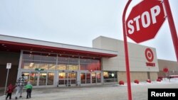 Target Corp. announced Thursday it would be closing all 133 stores in Canada; customers arrive at a Target store in St. Albert, Alberta, Jan. 15, 2015. 