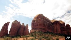 A landmark of Sedona's skyline and one of the most photographed sights in Arizona, Cathedral Rock is located in the Coconino National Forest.
