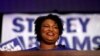 Democratic candidate for Georgia Governor Stacey Abrams smiles as she speaks during an election-night watch party, May 22, 2018, in Atlanta. 