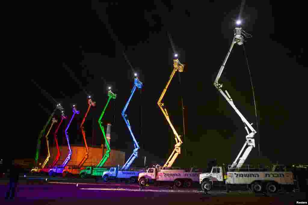 The lights are turned on for a giant menorah at the Reading Power Station in Tel Aviv, on the Jewish holiday of Hanukkah, Dec. 4, 2013.