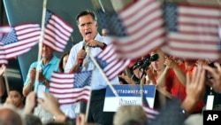 Republican presidential nominee Mitt Romney addresses the audience at a Victory Rally with the GOP team at the Military Aviation Museum in Virginia Beach, Va, Saturday, September 8, 2012.