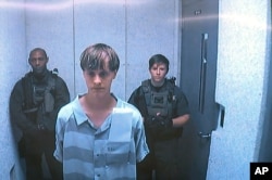 Dylann Roof appears via video before a judge in Charleston, S.C, June 19, 2015.