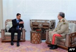 Suriya prezidenti Bashar al-Assad yangi Mudofaa vaziri Daud Rajaga ko'rsatma bermoqda