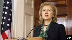Secretary of State Hillary Rodham Clinton makes a statement regarding the death of Osama bin Laden, at the State Department in Washington, May 2, 2011