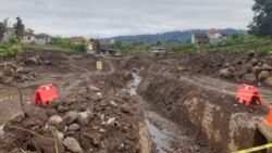 Lokasi banjir bandang di Desa Bulukerto, Kecamatan Bumiaji, Kota Batu (VOA/Petrus Riski).