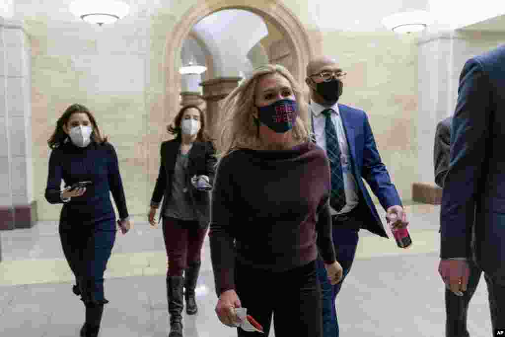 Rep. Marjorie Taylor Greene, R-Ga., walks back to her office after speaking on the floor of the House Chamber on Capitol Hill in Washington, D.C.&nbsp;The newly elected Georgia Republican asserted in a House speech that she was &ldquo;a very regular American&rdquo; who posted conspiracy theories from QAnon and other sources before she began campaigning for Congress.&nbsp;