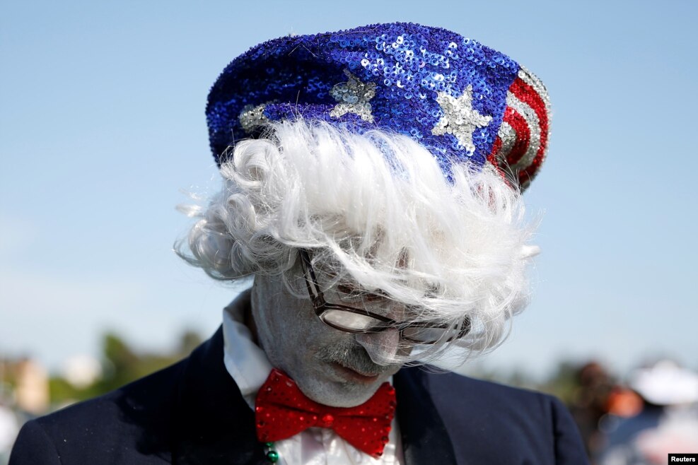 A man covered in face paint waits to see U.S. Democratic presidential candidate Bernie Sanders during a campaign event in Vallejo, California, May 18, 2016.