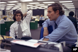 Washington Post reporters Carl Bernstein and Bob Woodward at work in 1973.