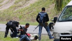 Malaysian Forces Fight Philippine Armed Group in Borneo