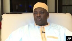 FILE - Gambia's Adama Barrow talks during an interview in Dakar, Senegal, Jan. 21, 2017.