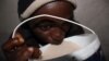 A man drinks umqombothi beer at a tavern in South Africa. (D. Taylor/VOA)