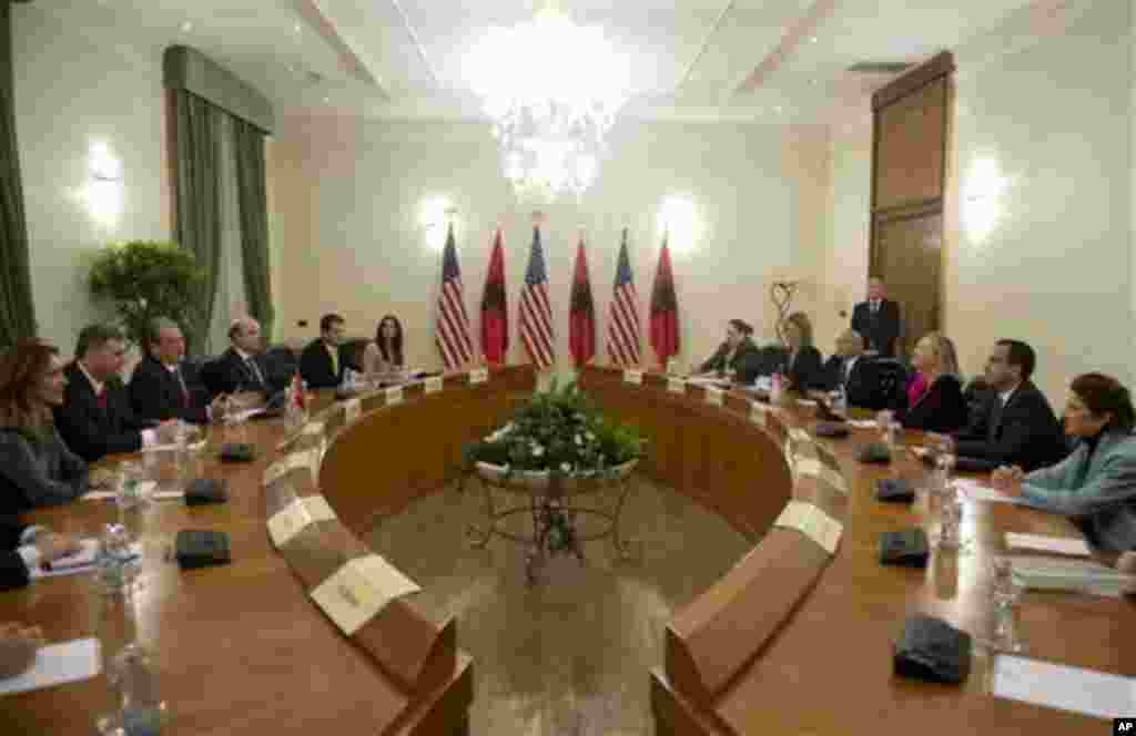 Albanian Prime Minister Sali Berisha, centre left, and US Secretary of State Hillary Clinton, centre right, hold meetings at the Prime Minister's Office in Tirana, Albania,Thursday, Nov. 1, 2012. Hillary Clinton arrived in EU-hopeful Albania on the last l