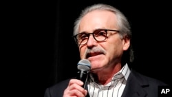 In this Jan. 31, 2014, photo, David Pecker, Chairman and CEO of American Media, addresses those attending a Super Bowl party in New York. 