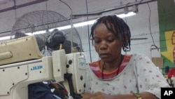 Gertha Jezulien has returned to work at the Island Apparel garment factory in Port-au-Prince, Haiti, 26 Jan 2010