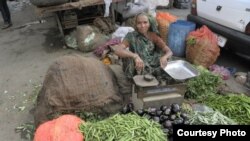 A SEWA vegetable vendor.