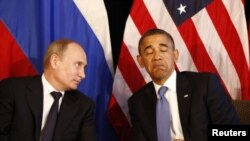 FILE - U.S. President Barack Obama and Russian President Vladimir Putin in Los Cabos, Mexico, June 18, 2012. 