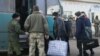 Ukraine, Pro-Russian Forces Trade Prisoners to Mark the New Year