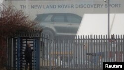 A worker arrives at Jaguar Land Rover's Halewood Plant in Liverpool, Britain, Jan. 10, 2019. 
