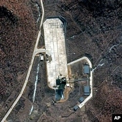 FILE - Satellite file image provided by DigitalGlobe shows North Korea’s Tongchang-ri launch facility on the nation’s western coast.