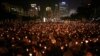 FILE - Candles flicker in Hong Kong's Victoria Park during a June 4, 2009, vigil to remember the crackdown on the pro-democracy movement in Beijing's Tiananmen Square. 