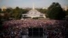 People pack the West Lawn of the U.S. Capitol to see Pope Francis appear on the Speaker's balcony during his speech to the U.S. Congress in Washington, Sept. 24 2015. 