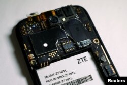 FILE - The inside of a ZTE smart phone is pictured in this illustration taken April 17, 2018.