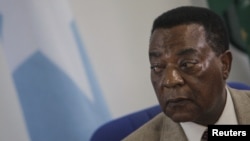 Augustine Mahiga, Special Representative of the United Nations Secretary General for Somalia and head of the U.N. Political Office in Somalia (UNPOS), looks on during a news conference in Mogadishu August 19, 2012, in this photograph released by the Afric