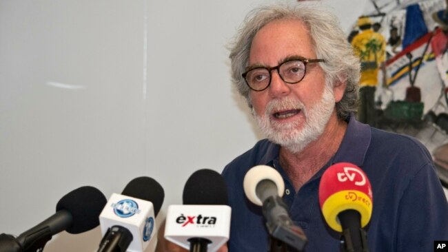 Public Health of Curaçao epidemiologist Dr. Izzy Gerstenbluth talks to reporters regarding the quarantined Church of Scientology ship docked in the port of Willemstad, Curacao, May 11, 2019.