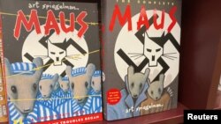 Two books of the graphic novel 'Maus' by American cartoonist Art Spiegelman are pictured in this illustration, in Pasadena, California, Jan. 27, 2022.