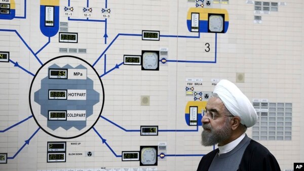 FILE - President Hassan Rouhani visits the Bushehr nuclear power plant just outside of Bushehr, Iran on Jan. 13, 2015. (AP) 